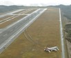 An aerial view shows an Asiana Airlines airplane which ran out of runway after landing at Hiroshima airport in Mihara