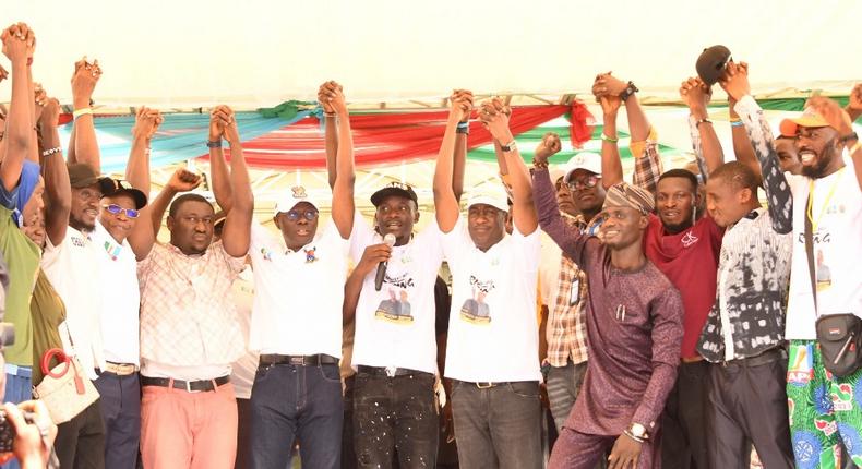 Gov. Babajide Sanwo-Olu of Lagos State (sixth left) and his Deputy, Dr Obafemi Hamzat (sixth right) being endorsed by National Association of Nigerian Students (NANS) Lagos State led by the Chairman, Comrade Olusesi Tolulope during the students mega rally at the Mobolaji Johnson Arena, Onikan, on Friday, Jan. 27, 2023.