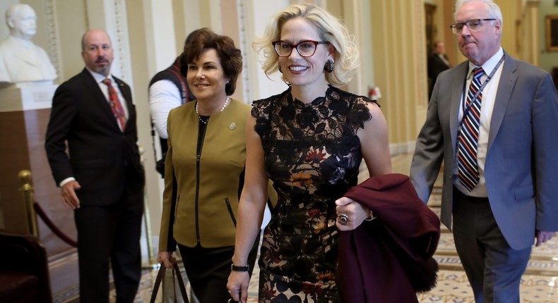 Democratic senators-elect Kyrsten Sinema (L) (D-AZ) and Jacky Rosen (R) (D-NV) walk to the office of Senate Minority Leader Chuck Schumer for a meeting at the U.S. Capitol November 13, 2018 in Washington, DC.
