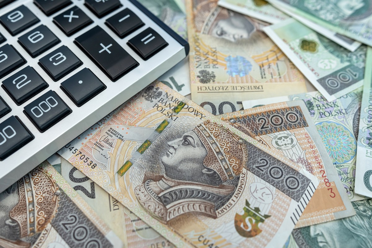 Polish,Zloty,Banknotes,,Calculator.,Money,Concept,,Finance,And,Rich,A