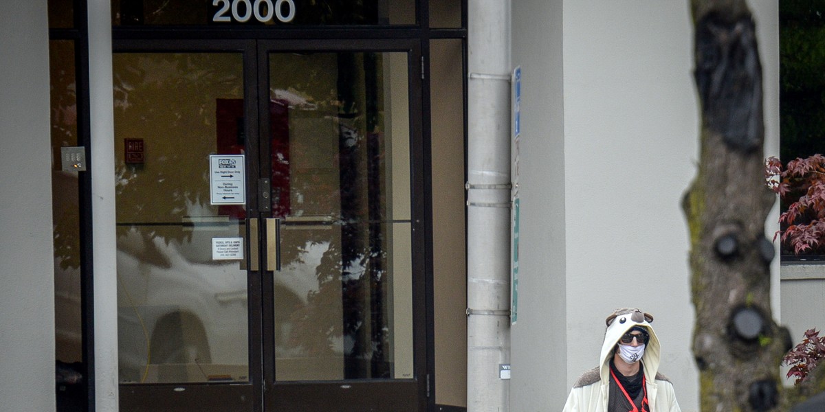 A man claiming to be in possession of a bomb exits the Fox45 television station that was evacuated due to a bomb threat in Baltimore, Maryland, U.S. April 28, 2016.