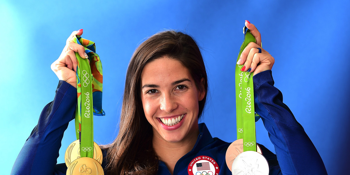 Swimmer, Maya DiRado of the United States poses for a photo with her four medals.