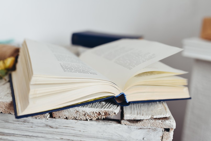Book,On,A,White,Wooden,Shelf.,Open,Book