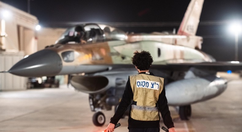 In this photo provided by the Israeli army, armed Israeli Air Force planes depart from an unknown location to attack Iran on October 26, 2024.IDF) / Handout/Anadolu via Getty Images