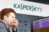 FILE PHOTO: An employee works near screens in the virus lab at the headquarters of Russian cyber security company Kaspersky Labs in Moscow