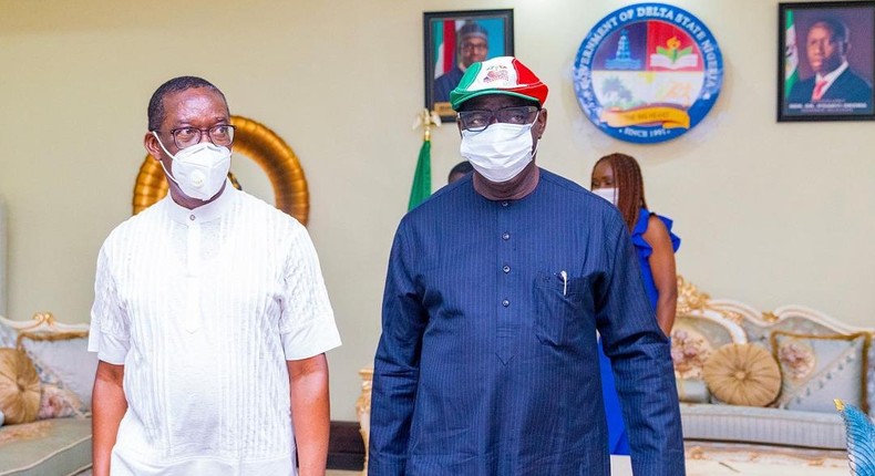 Okowa (left) receives victorious Obaseki (right) at Govt House Asaba (Delta State media team) 