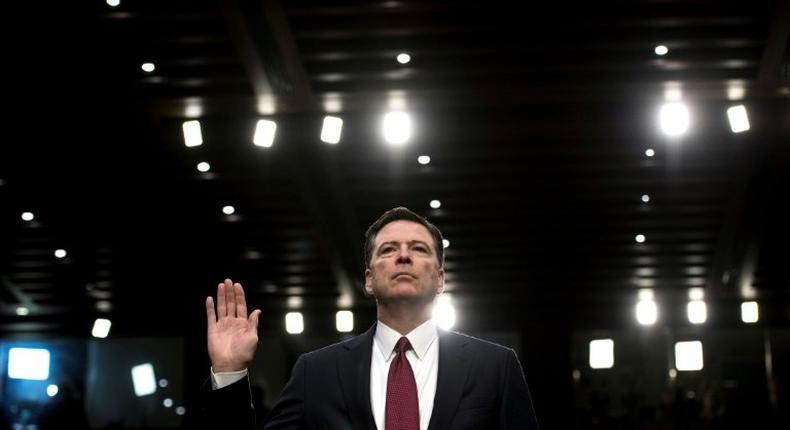 Ousted FBI director James Comey is sworn in during a hearing before the Senate Select Committee on Intelligence on June 8, 2017