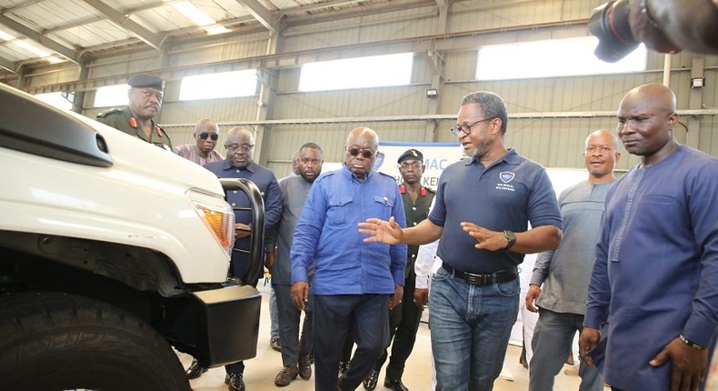 Mr-Kenneth-Akibate-middle-showing-some-of-the-assembled-vehicles-to-President-Akufo-Addo-on-tour-of-the-facility