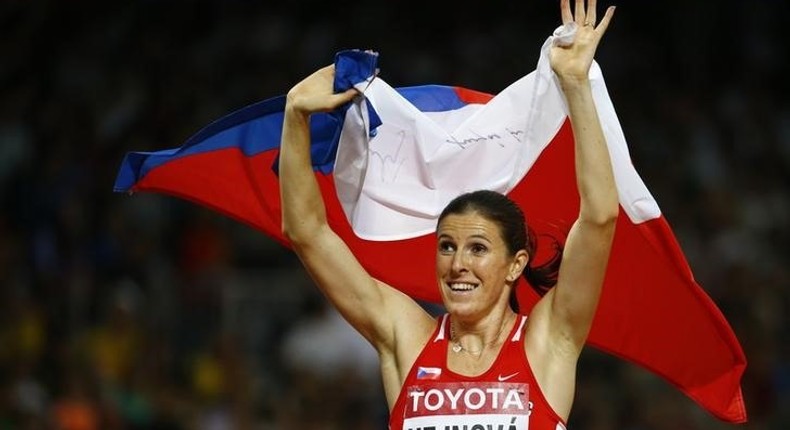 Athletics-Czech Hejnova first woman to retain 400m hurdles title