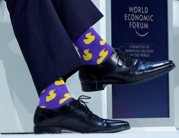 Canadian Prime Minister's Justin Trudeau's socks are seen as he attends the World Economic Forum (WE