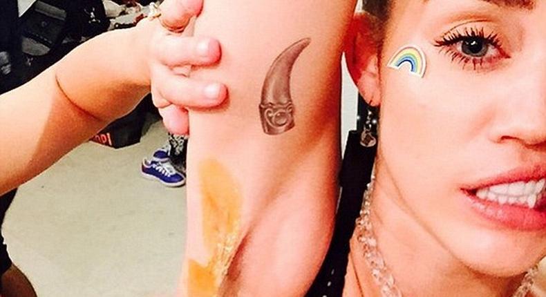 Miley Cyrus getting her armpits waxed