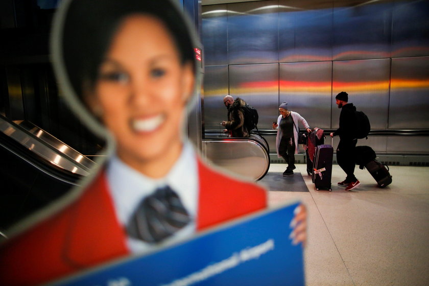 Travelers arrive for TSA inspection as they make their way through Newark Liberty International Airp