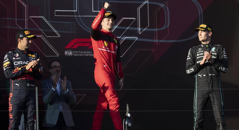 Charles Leclerc (M) celebrating his P1 finish at the Australian GP