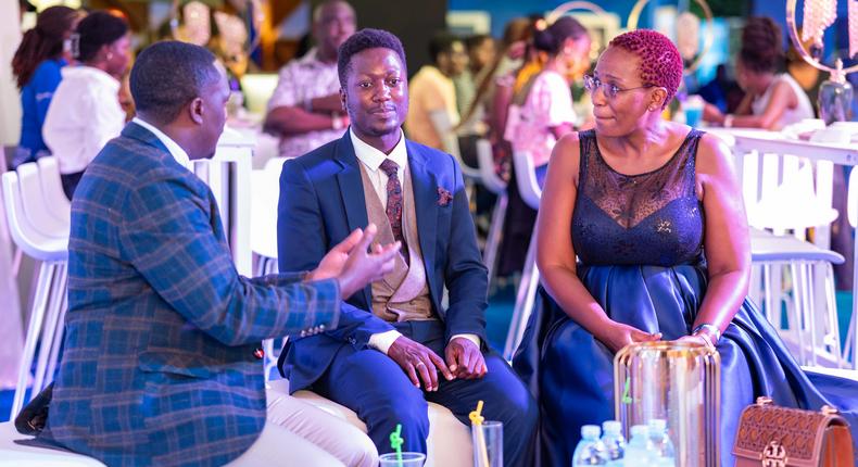 L-R: Brian Mulondo, the local content manager of MultiChoice Uganda, Jerry Sesanga the show director and Bina Baibe the host of the show, during the premiere of Mum Vs Wife.