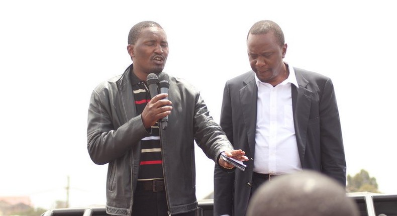 Devolution CS Mwangi Kiunjuri and President Uhuru Kenyatta 