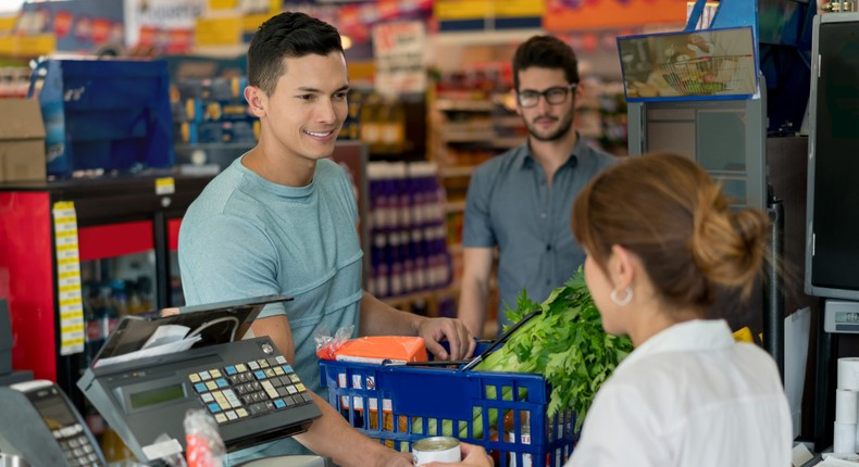 Claire (not pictured) makes $13 an hour as a cashier.