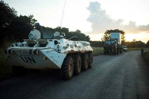 A MINUSCA patrol in the Central African Republic secures a truck experiencing engine failure on the road between Bouar and Bangui in October 2017