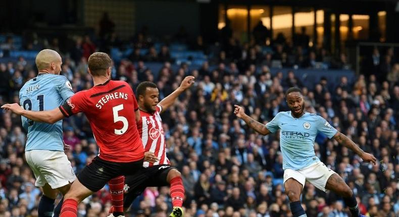 Raheem Sterling, pictured scoring Manchester City's fourth goal, was in superb form as the Premier League champions returned to the top of the table with a 6-1 thrashing of Southampton