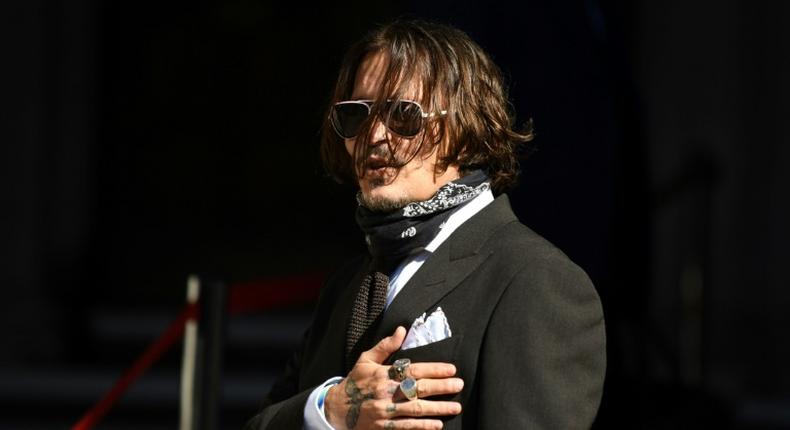 Johnny Depp said the headline in The Sun tabloid altered his Hollywood image and endangered his career