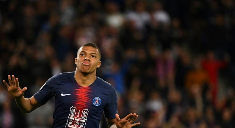 France's World Cup winner Kylian Mbappe scored a hat-trick against Monaco in a shirt paying tribute to the Notre Dame