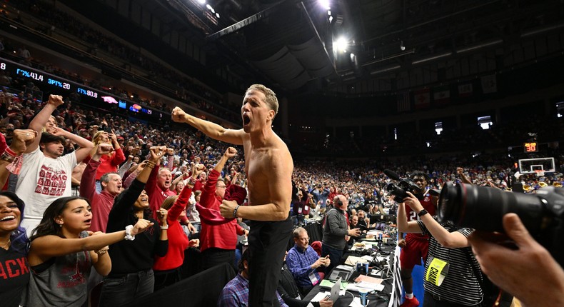 Arkansas Razorbacks head coach Eric Musselman celebrates his team's victory over the Kansas Jayhawks during the NCAA Men's Basketball Tournament on March 18, 2023, in Des Moines, Iowa.Jamie Sabau/NCAA Photos via Getty Images