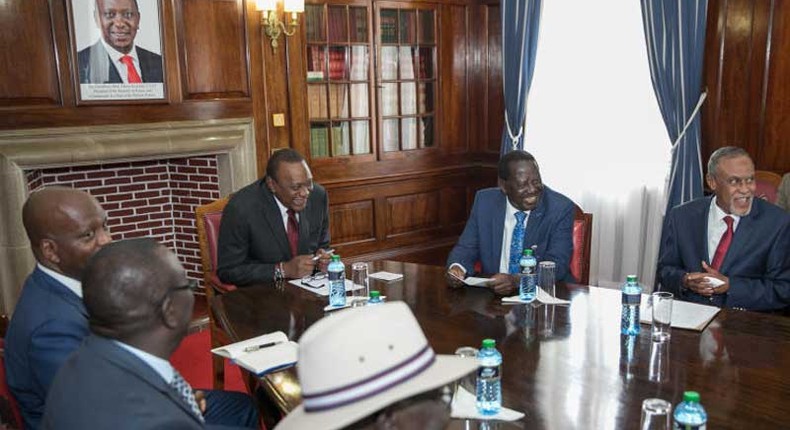 President Uhuru Kenyatta and Raila Odinga with members of the Building Bridges Initiative taskforce at State House