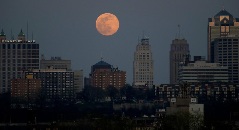 A supermoon rises behind a downtown office building in Kansas City, Missouri.Charlie Riedel/AP