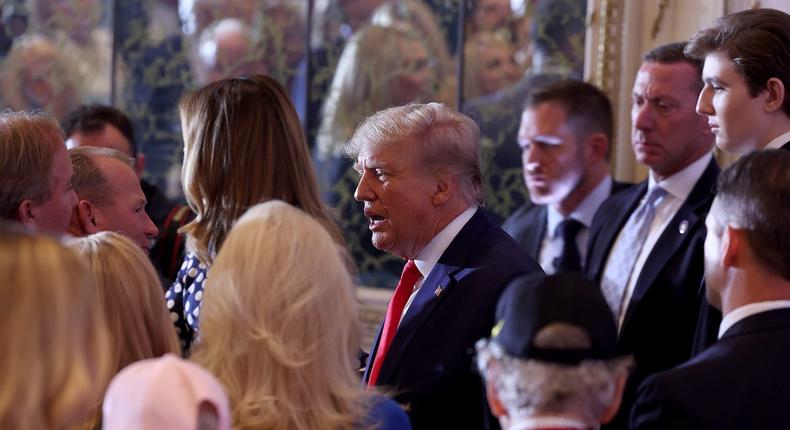 Former President Donald Trump greets people at his Mar-a-Lago home in Palm Beach, Florida, on November 15, 2022.Joe Raedle/Getty Images