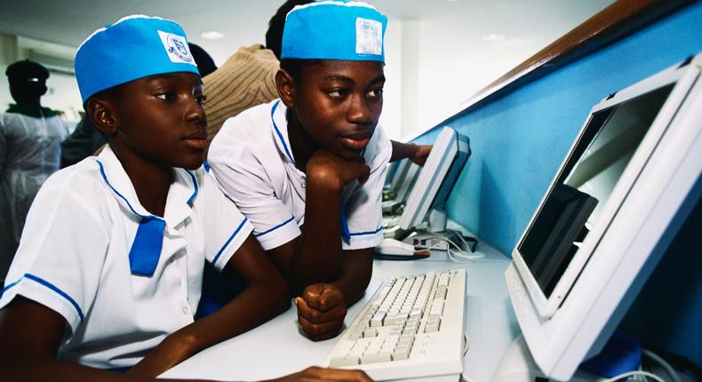 Some Nigerian secondary school students working on a computer. [Getty Images]