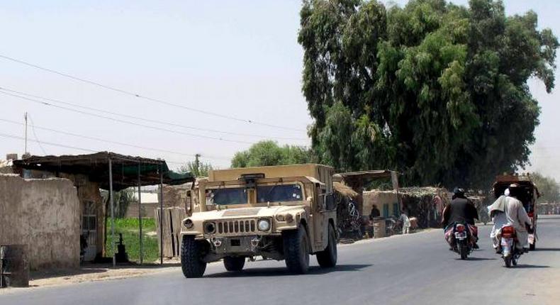 NATO troops killed in Afghanistan's Helmand, Taliban grab district
