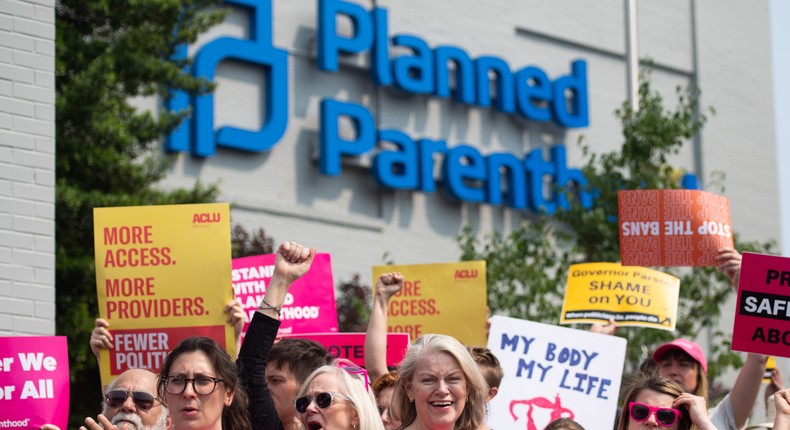 Pro-choice supporters and staff of Planned Parenthood hold a rally outside the Planned Parenthood Reproductive Health Services Center in St. Louis, Missouri, May 31, 2019.