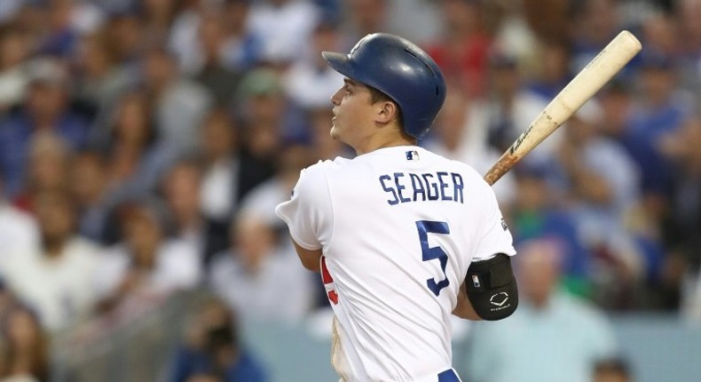 Los Angeles Dodgers' shortstop Corey Seager was unanimously selected for the Rookie of the Year honor by the Baseball Writers' Association of America