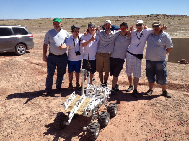 A photo of the winning student team ("Hyperion Team" - Bialystok University of Technology, Poland) of the Mars Societys 2013 University Rover Challenge (URC).