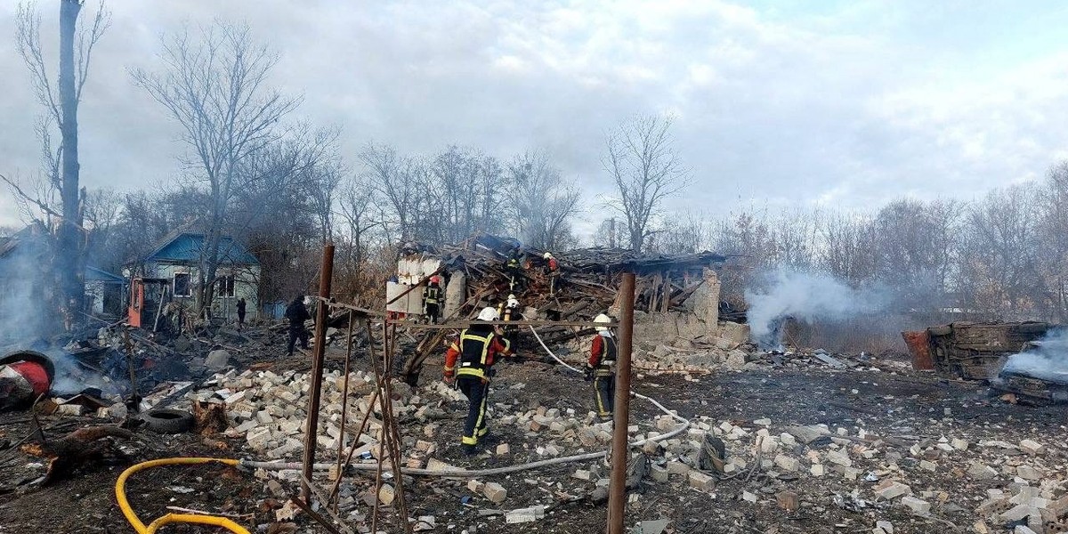 Rescuers work at a site of private houses heavily damaged by a Russian missile strike in Kyiv