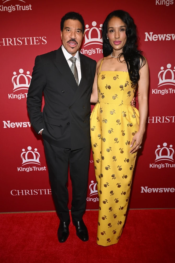 Lajonel Riči sa partnerkom