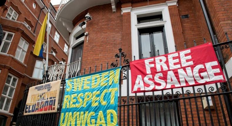 Banners supporting WikiLeaks founder Julian Assange are pictured outside the Ecuadorian Embassy in London