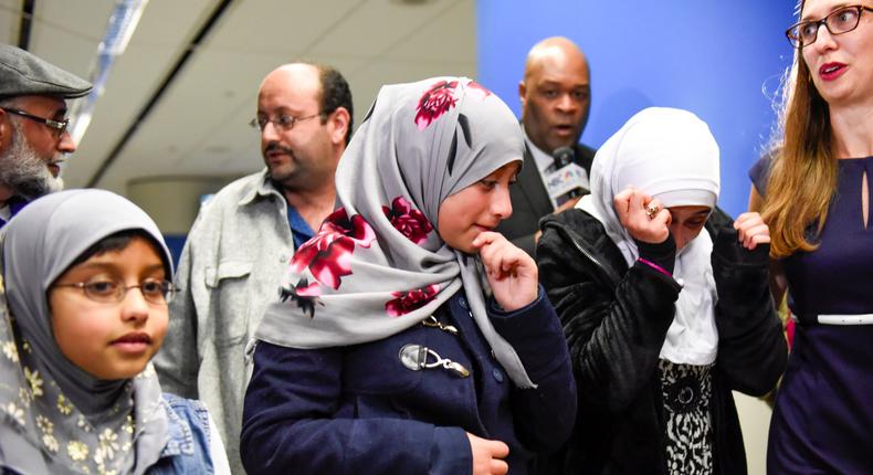 12-year old Eman Ali of Yemen is reunited with her family as she arrives at San Francisco International Airport in San Francisco after Trump's ban was lifted in February.