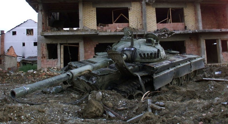 A Russian tank of the Yugoslav Army sits abandoned 19 June 1999 in the eastern Kosovar village of Klina after having been destroyed by NATO air strikes.ERIC FEFERBERG/AFP via Getty Images