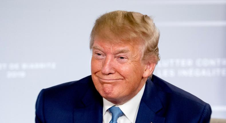 U.S President Donald Trump smiles during a news conference with Japanese Prime Minister Shinzo Abe at the G-7 summit in Biarritz, France, Sunday, Aug. 25, 2019, where they announced that the U.S. and Japan have agreed in principle on a new trade agreement. (AP Photo/Andrew Harnik)