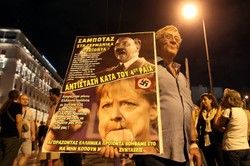 Tak protestują przeciwko wizycie Angeli Merkel: Córko Hitlera, won z Grecji!