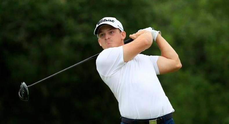 Bud Cauley plays his shot from the ninth tee during the second round of the Texas Open in San Antonio, Texas