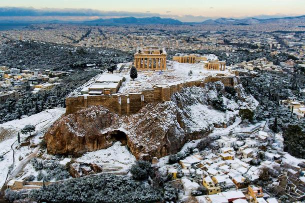 The Parthenon temple atop the ancient Acropolis is seen following a rare snowfall in Athens