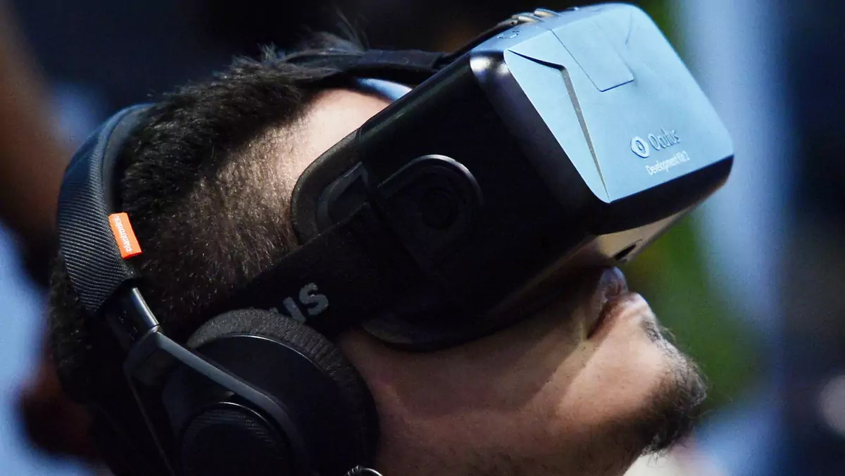 An attendee tries on the Oculus VR Inc. Rift Development Kit 2 headset at E3 in Los Angeles