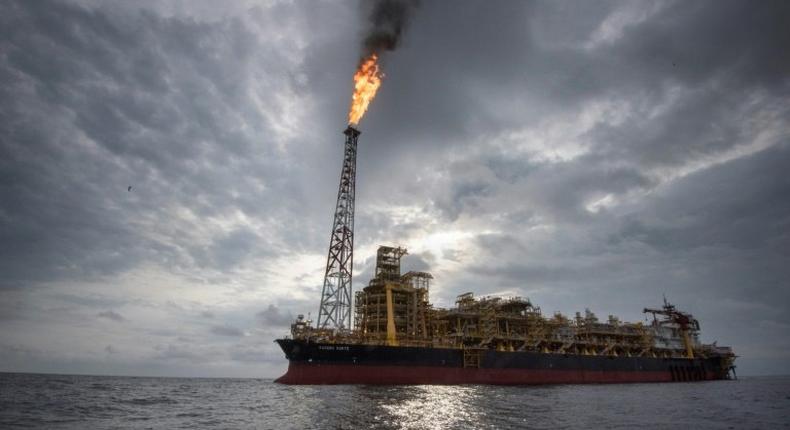 The Kaombo Norte is a vast oil-extraction vessel, moored off the coast of Angola