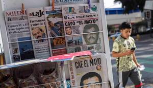 Mexican newspapers reporting El Mayo's arrest.RODRIGO OROPEZA/Getty Images