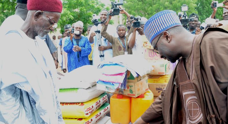 ___4103933___https:______static.pulse.com.gh___webservice___escenic___binary___4103933___2015___8___25___16___PIC.5.+DIRECTOR-GENERAL+OF+NEMA+PRESENTS+RELIEF+MATERIALS+TO+FLOOD++VICTIMS+IN+DAURA