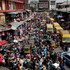 People crowd a street in Lagos ahead of Christmas in 2016 (Punch).