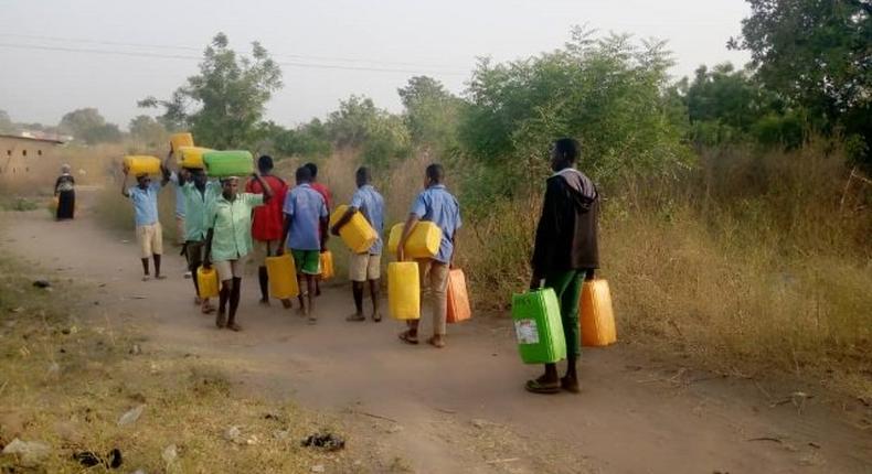 Students travel far to fetch water