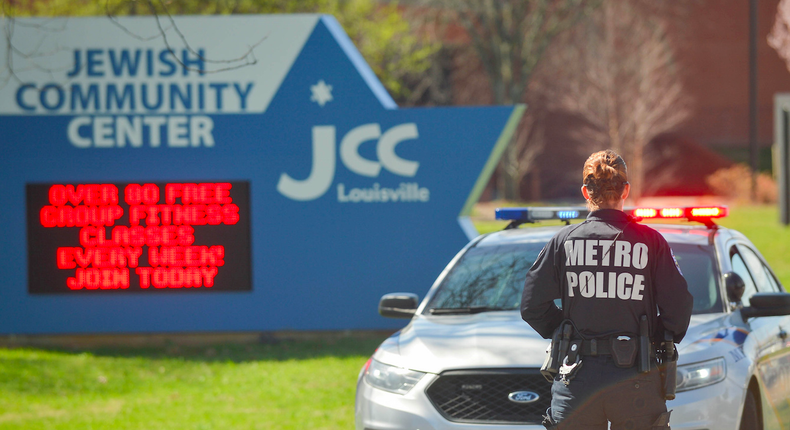 A police officer seen March 8 during a response to a bomb threat at a Jewish community center in Louisville, Kentucky.