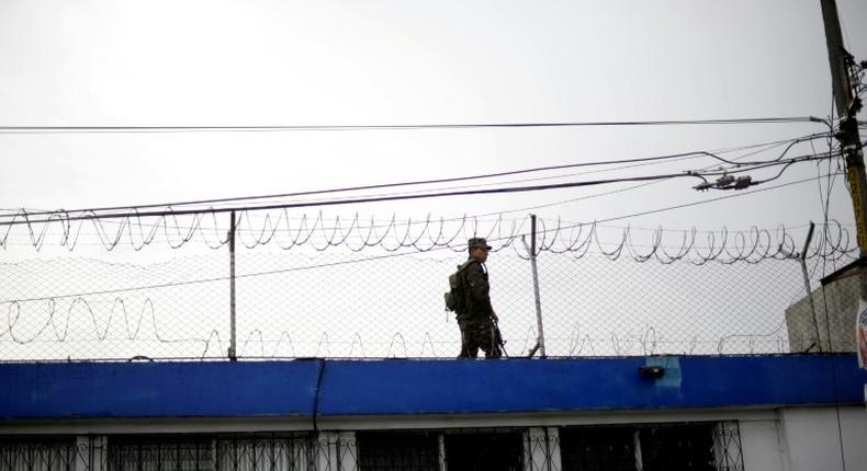 A soldier guards the correctional centre for minors, 'Las Gaviotas', in Guatemala City on July 7, 2015